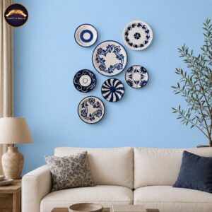 handcrafted blue pottery wall hanging plates set (7 pieces) – blue & white ceramic floral wall decor for living room