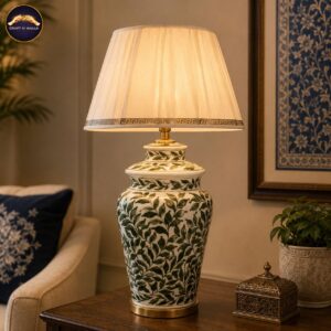 handcrafted blue pottery table lamp with green leaf floral design & fabric shade